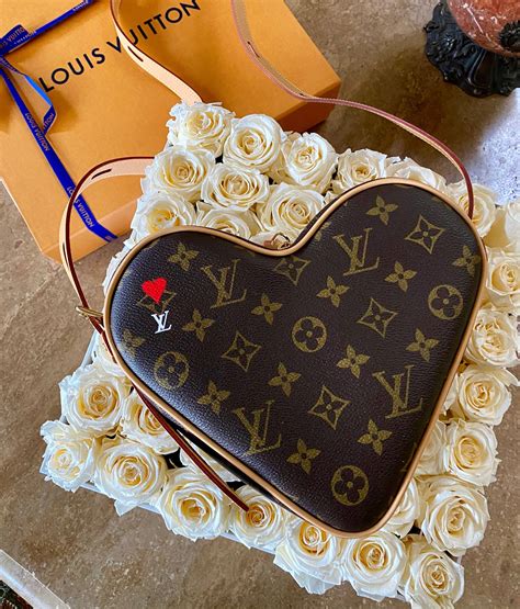 heart shaped lv purse.